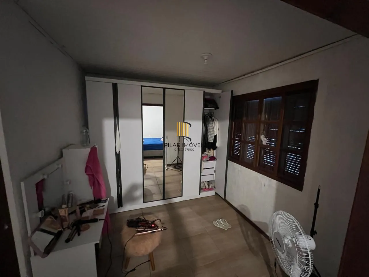 Ótima casa em de 2 dormitórios com piscina  localizada em Viamão