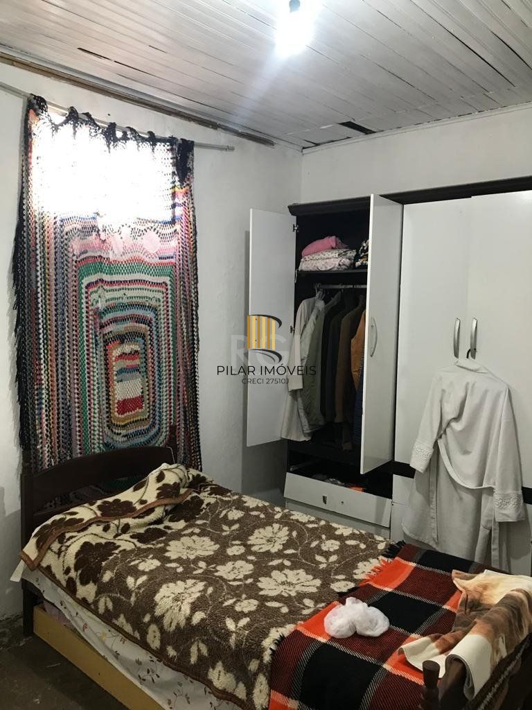 Casa no bairro Camaquã - 4 dormitórios