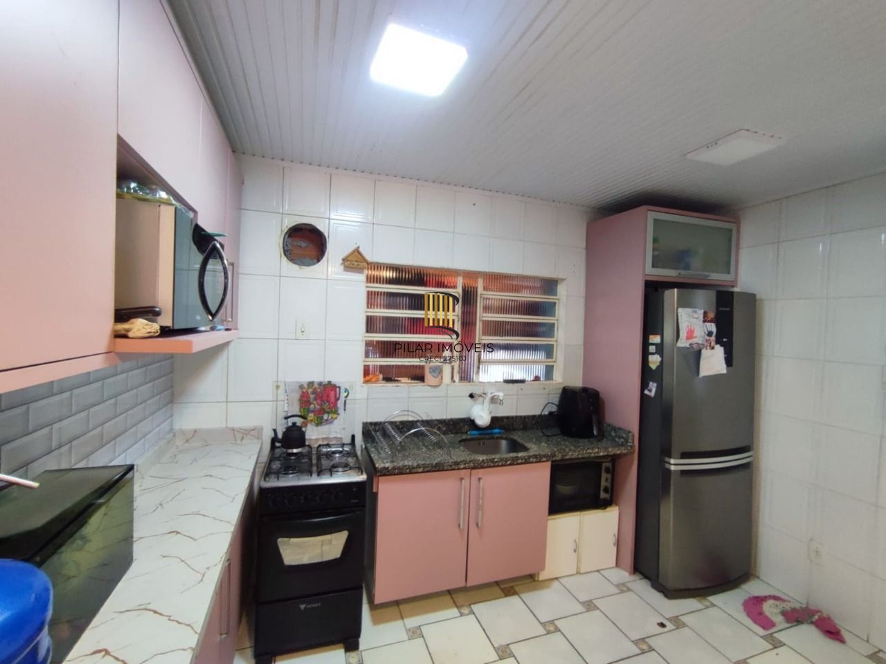 Casa no bairro Teresópolis - 3 dormitórios