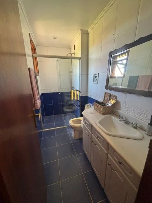 Residência de Luxo em Condomínio Fechado com 4 Dormitórios, 3 Suítes e Área de Lazer Privativa – São Lucas, Viamão/RS