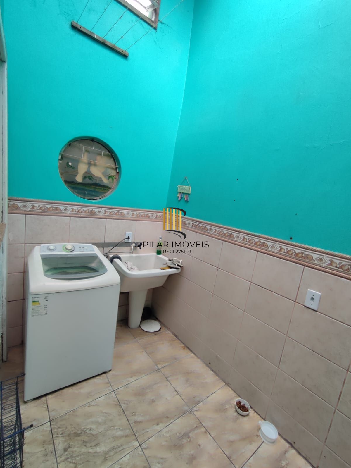 Casa no bairro Restinga - 3 dormitórios