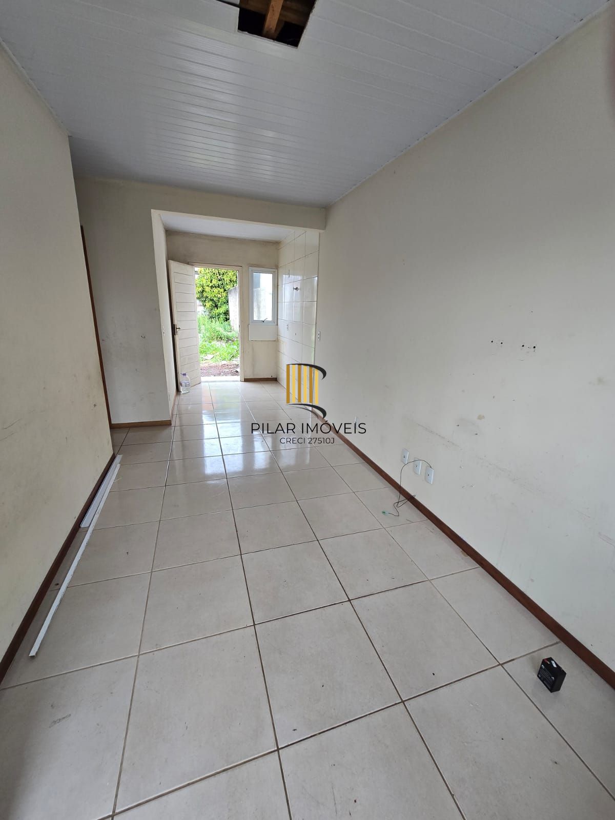 Casa com dois dormitórios no bairro Hípica - 1 vaga - financiável