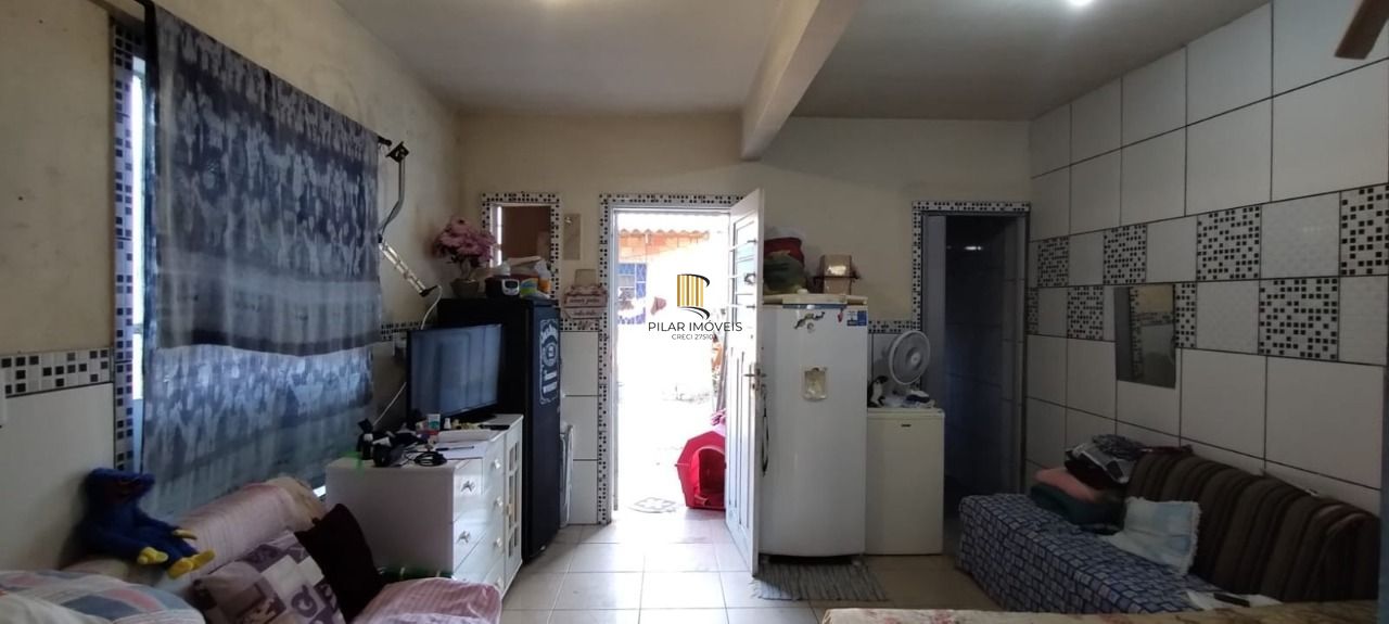 Casa no bairro Restinga - 5 dormitórios