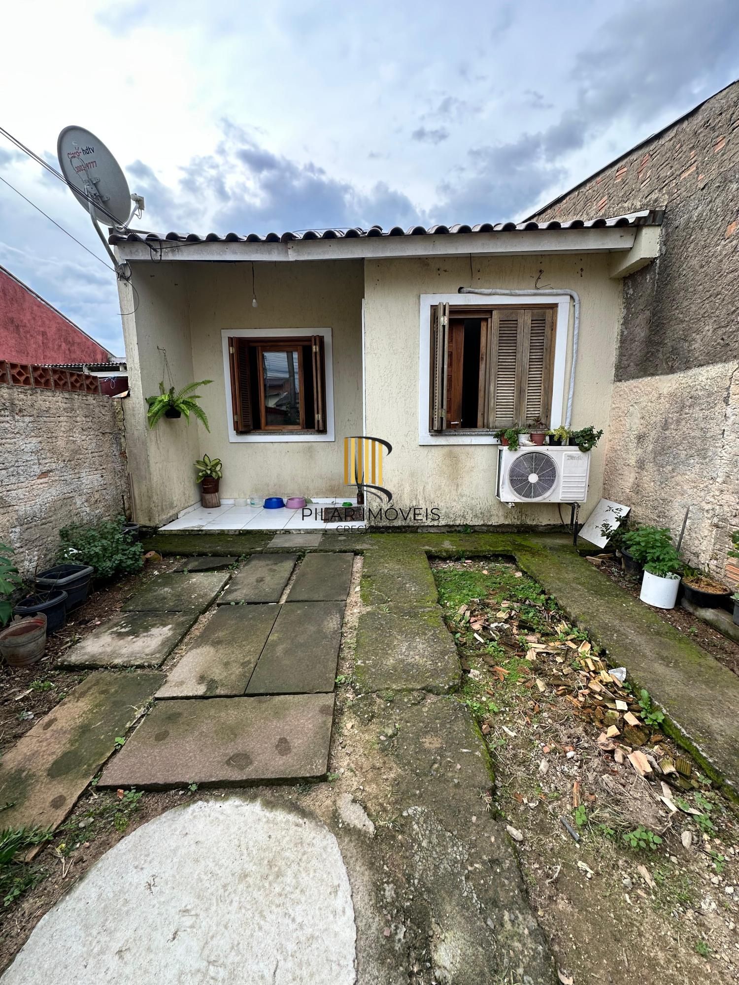 Casa 2 dormitórios no Bairro Hípica - FINANCIÁVEL