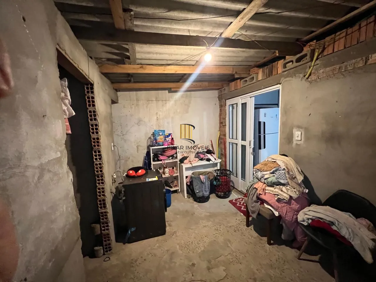 Ótima casa em de 2 dormitórios com piscina  localizada em Viamão