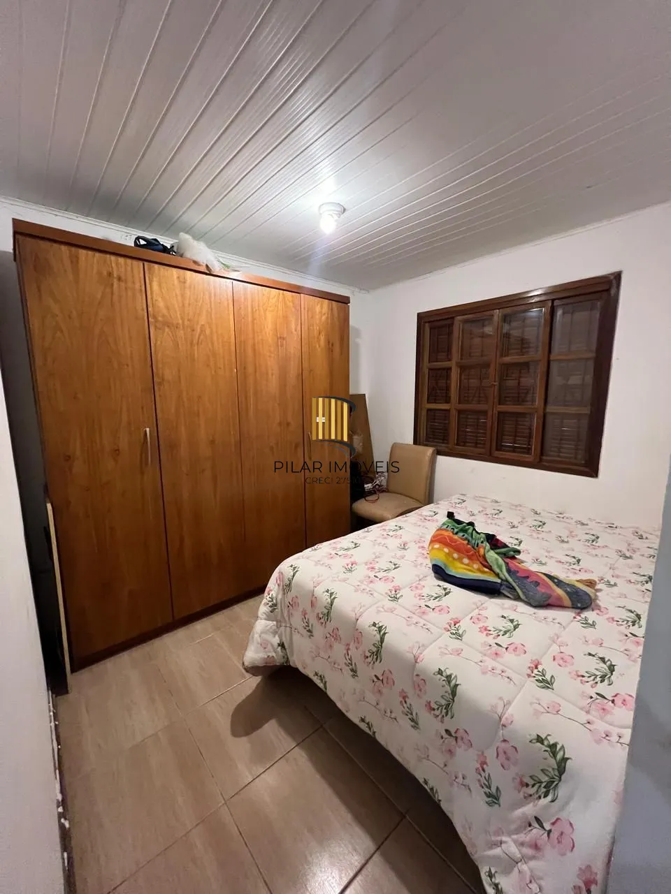Ótima casa em de 2 dormitórios com piscina  localizada em Viamão