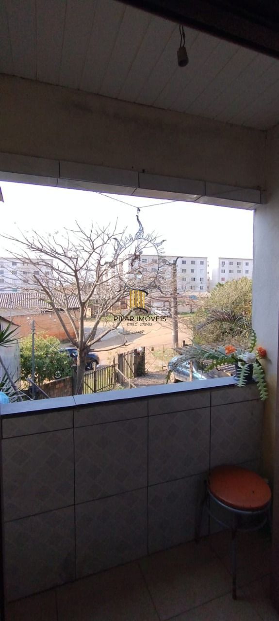 Casa no bairro Restinga - 5 dormitórios