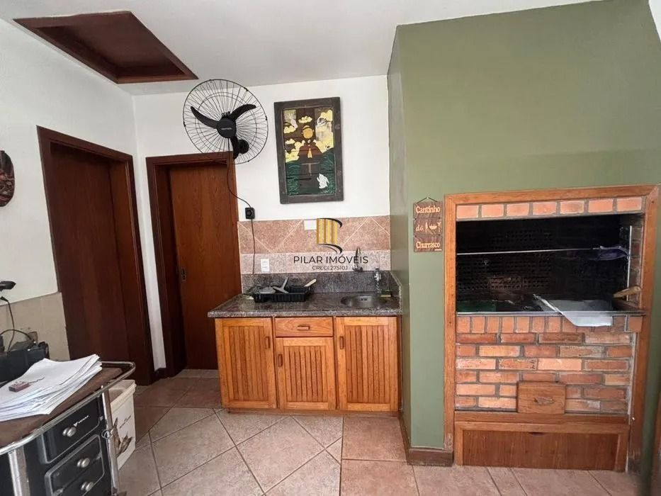 Residência de Luxo em Condomínio Fechado com 4 Dormitórios, 3 Suítes e Área de Lazer Privativa – São Lucas, Viamão/RS