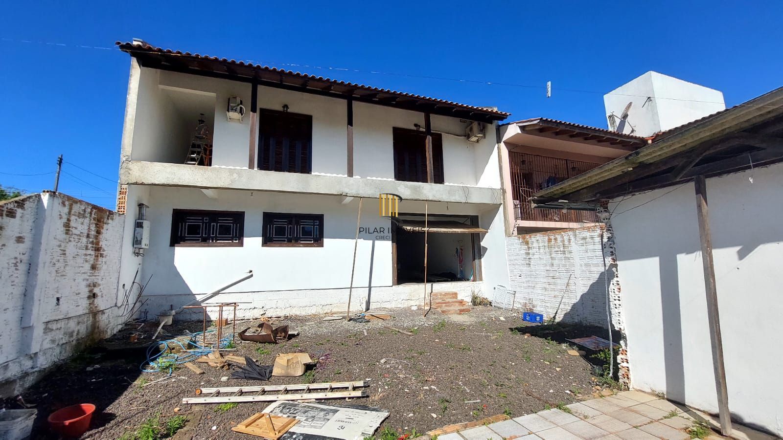Casa no bairro Vila Nova - 4 dormitórios, Sendo 1 Suíte