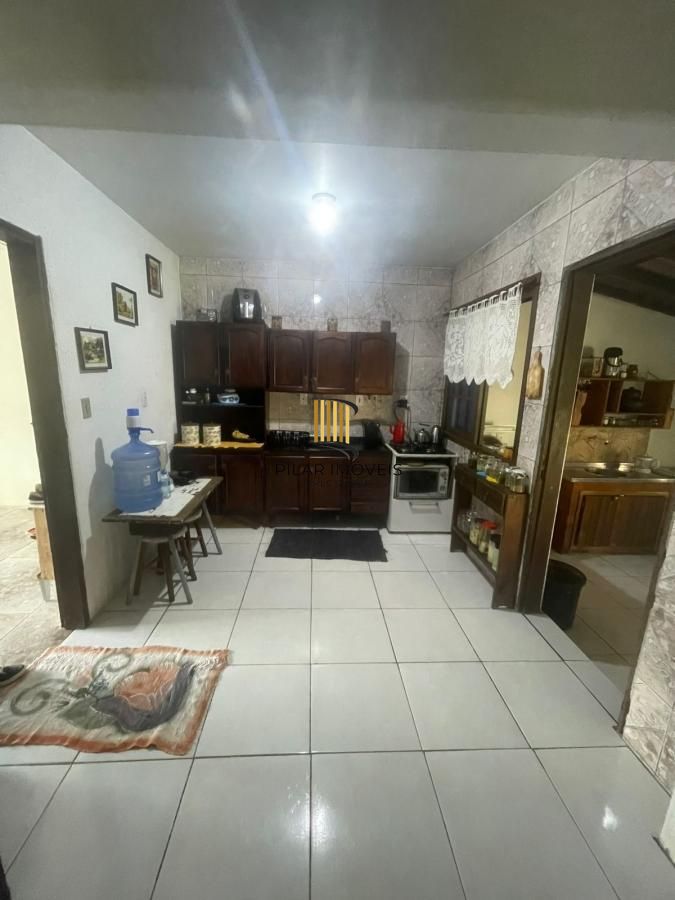 Casa 2 dormitórios bairro Lami