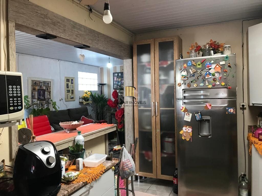 Casa no bairro Camaquã - 4 dormitórios