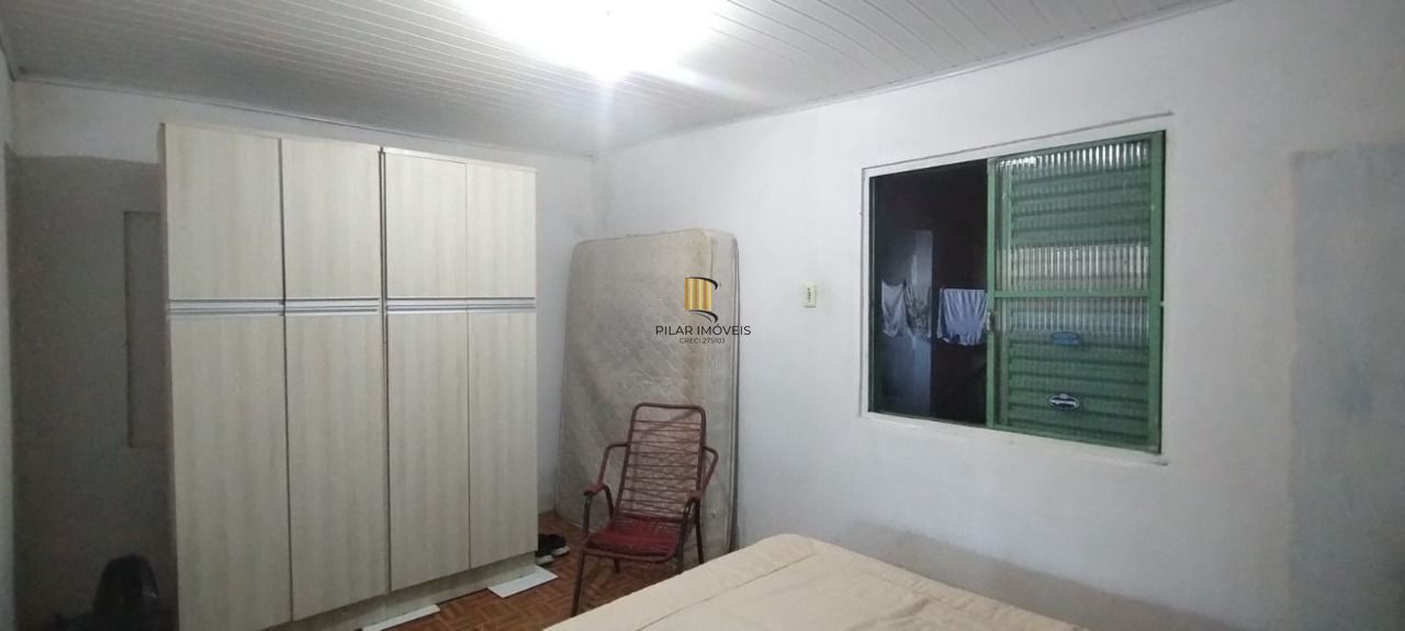 Casa no bairro Restinga - 4 dormitórios