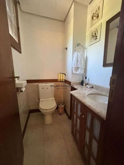Residência de Luxo em Condomínio Fechado com 4 Dormitórios, 3 Suítes e Área de Lazer Privativa – São Lucas, Viamão/RS