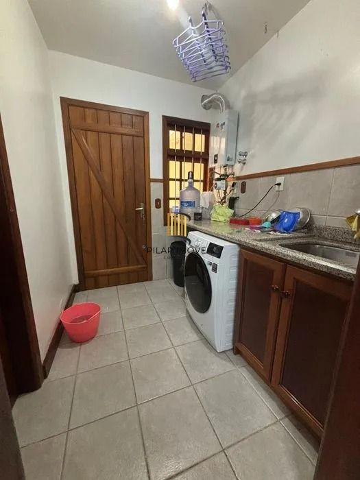 Residência de Luxo em Condomínio Fechado com 4 Dormitórios, 3 Suítes e Área de Lazer Privativa – São Lucas, Viamão/RS