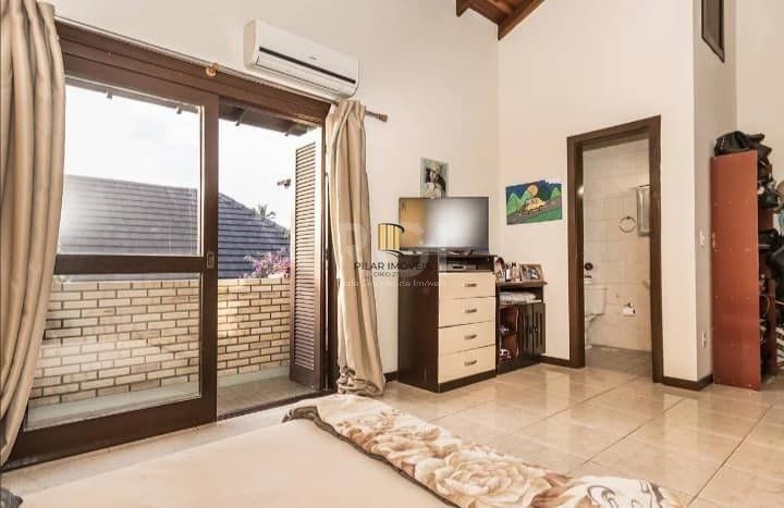 Casa de Condomínio 3 dormitórios no bairro Ipanema