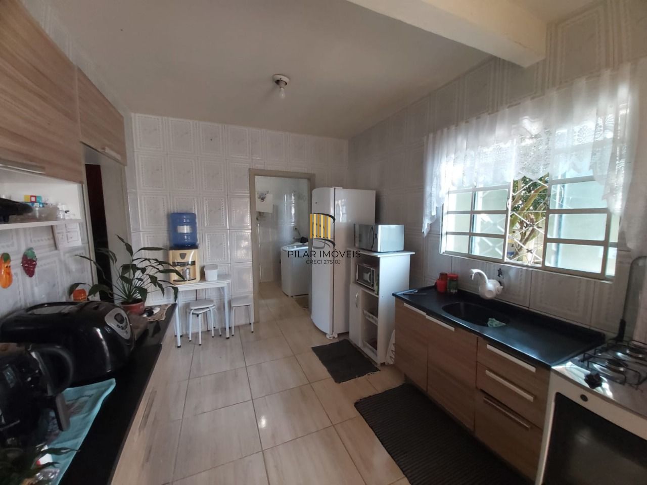 Casa no bairro Vila Nova - 3 dormitórios