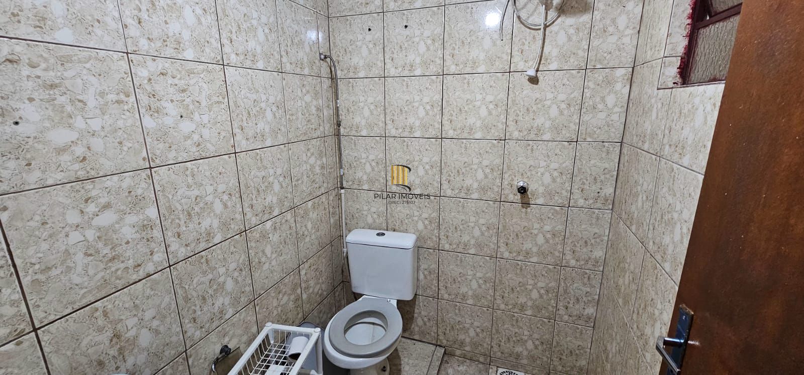 Casa no bairro Restinga - 3 dormitórios