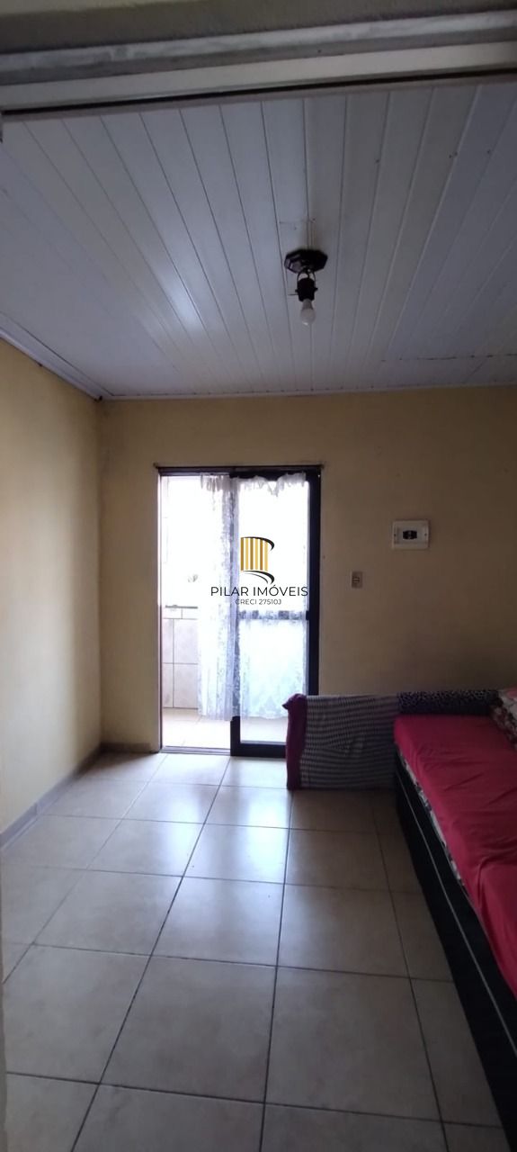 Casa no bairro Restinga - 5 dormitórios