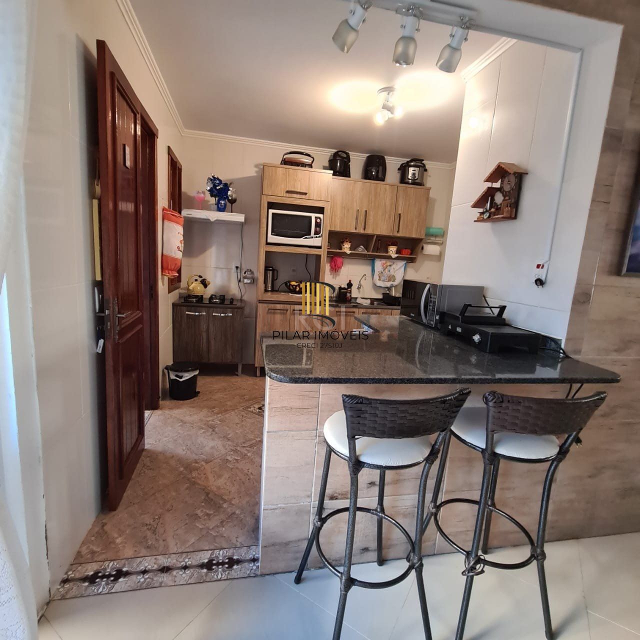 Casa no bairro Hípica - 4 dormitórios