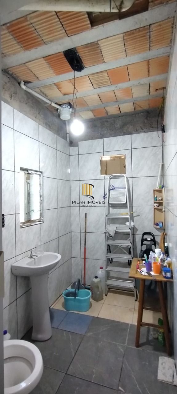 Casa no bairro Restinga - 5 dormitórios