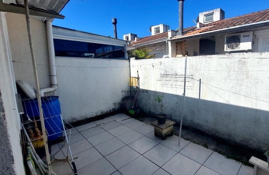 Casa em condomínio no bairro Hípica - 2 dormitórios - 1 Vaga