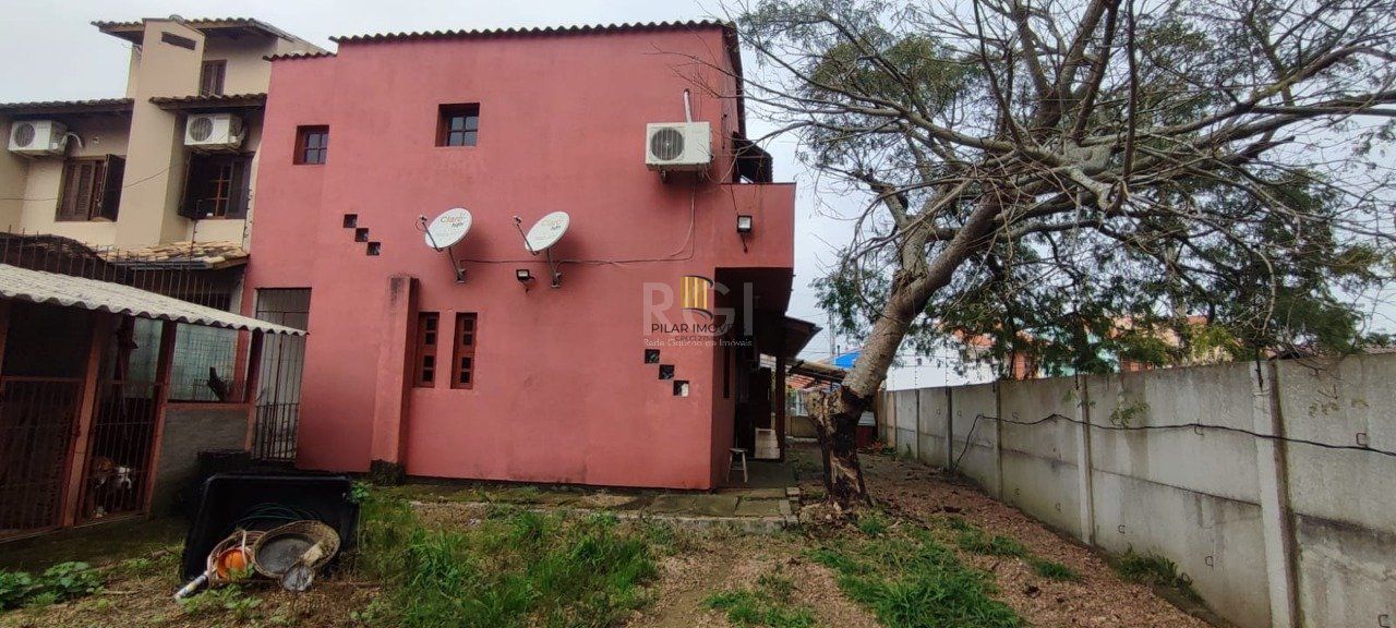 Casa de esquina no bairro Guarujá