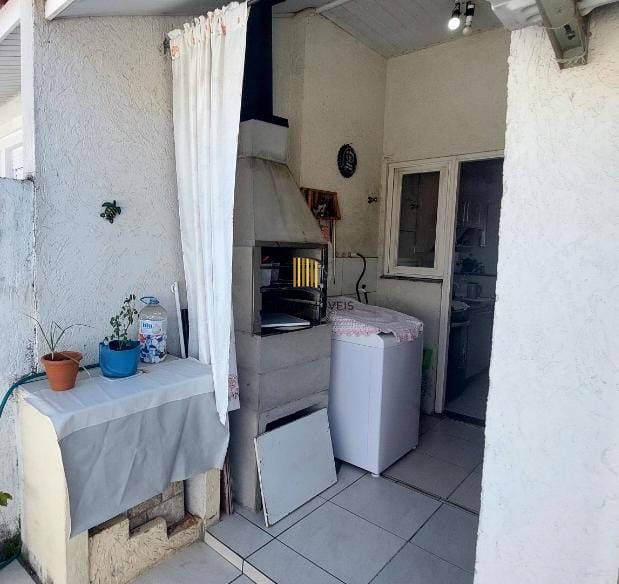 Casa em condomínio no bairro Hípica - 2 dormitórios - 1 Vaga