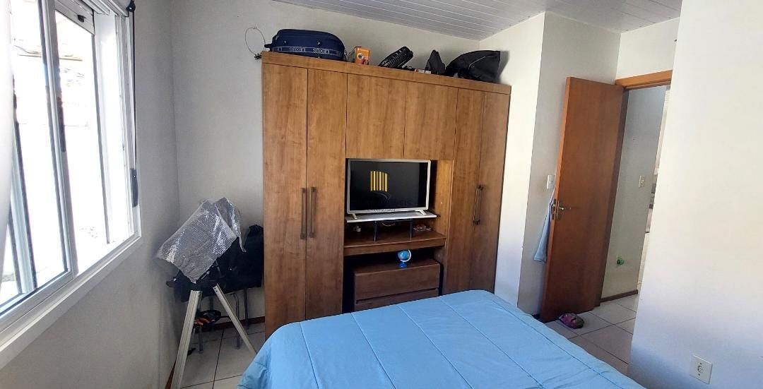 Casa em condomínio no bairro Hípica - 2 dormitórios - 1 Vaga