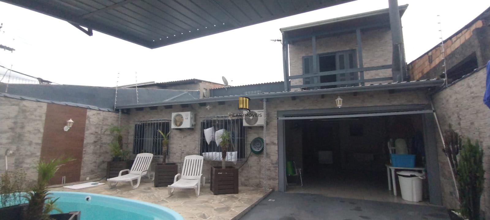 Casa no bairro Restinga com piscina com 4 dormitórios