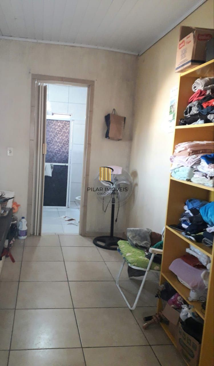 Terreno com 2 casas de Alvenaria