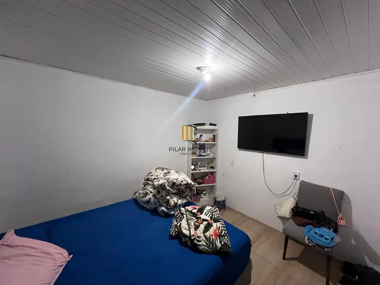 Ótima casa em de 2 dormitórios com piscina  localizada em Viamão
