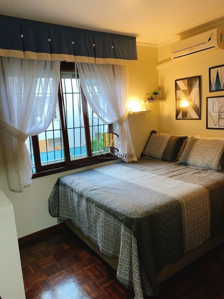 Apartamento no bairro Auxiliadora de 3 dormitórios e vaga