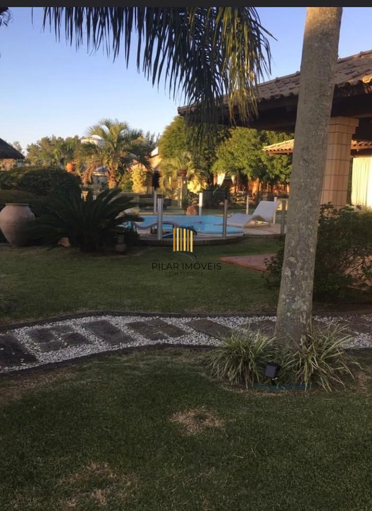 Casa na praia de Atlântida de 4 dormitórios