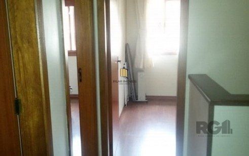 Casa em condomínio no Partenon de 3 dormitórios e vaga