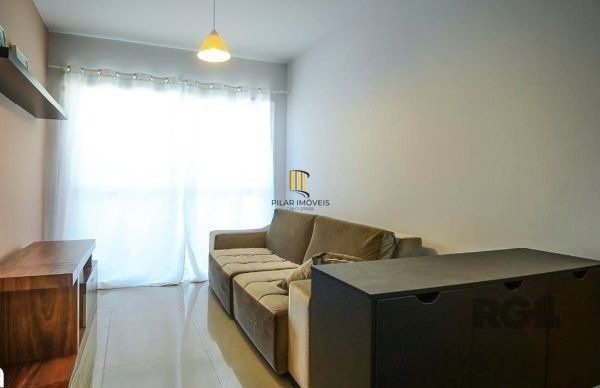 Apartamento no Urbano Menino Deus de 1 dormitório vaga e pátio