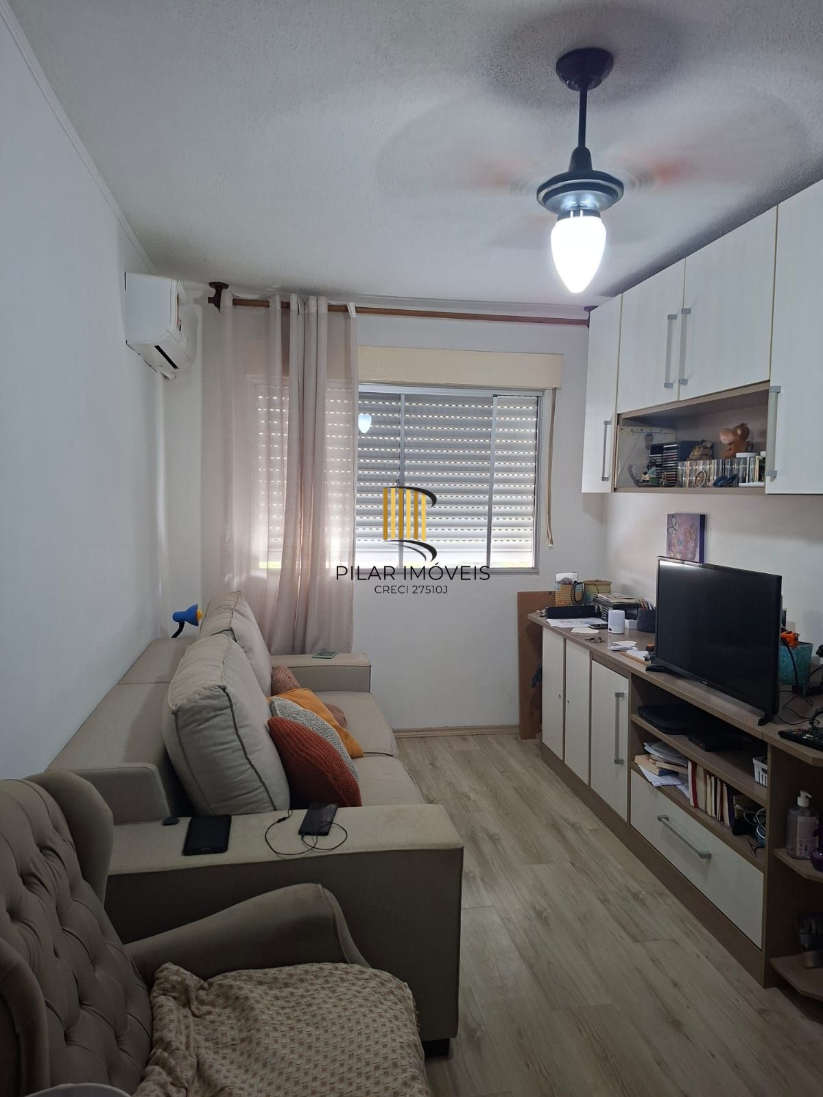 Apartamento no bairro Santo Antônio de 2 dormitórios e vaga rotativa - Pilar Imóveis