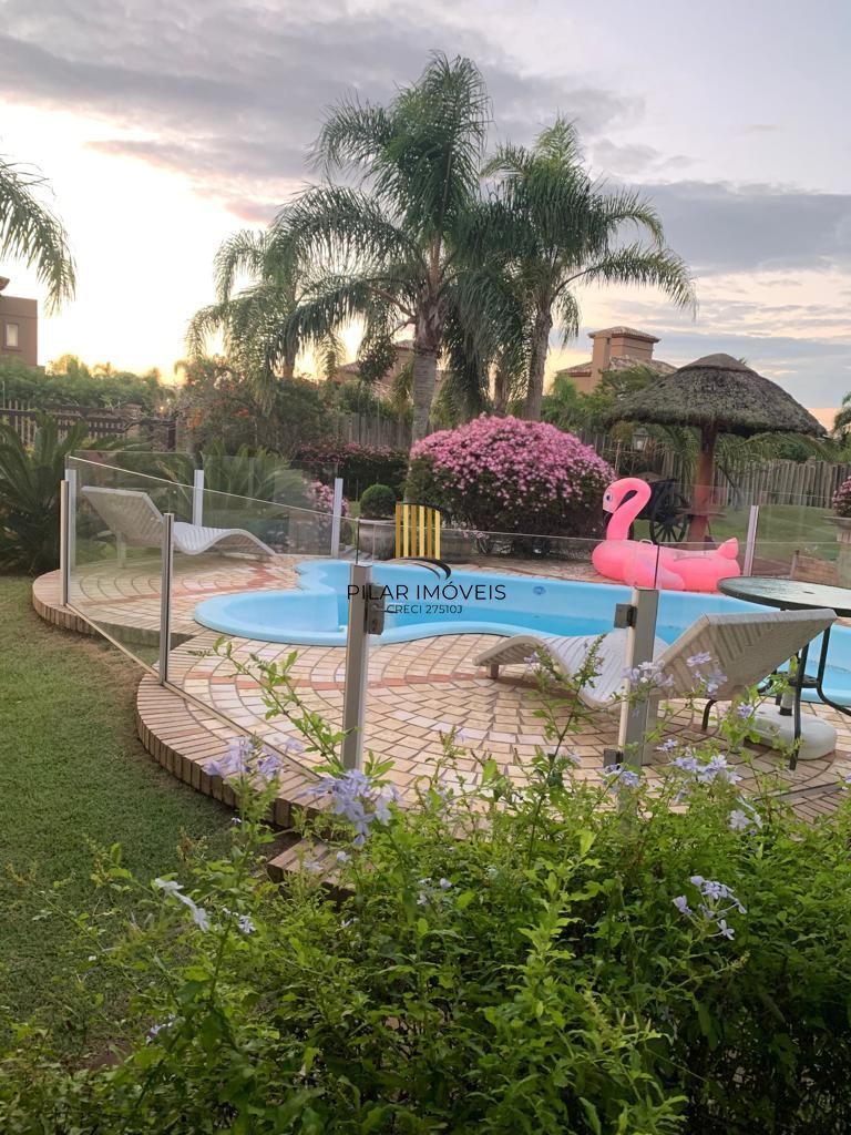 Casa na praia de Atlântida de 4 dormitórios