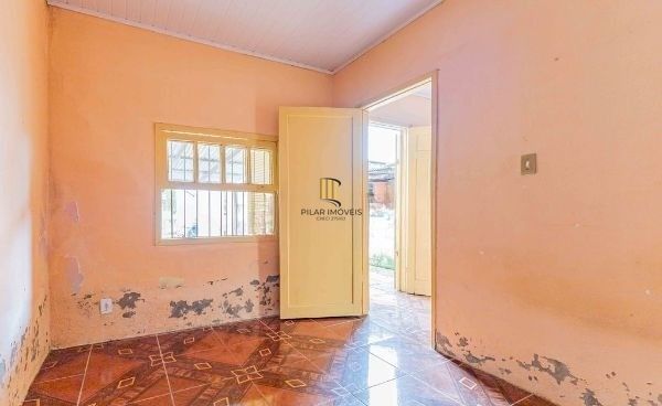 Terreno com 2 Casas de alvenaria no bairro Sarandi
