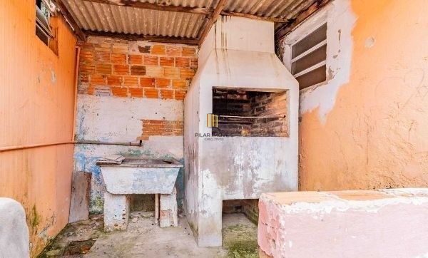 Terreno com 2 Casas de alvenaria no bairro Sarandi