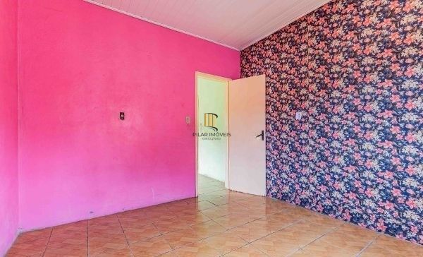 Terreno com 2 Casas de alvenaria no bairro Sarandi