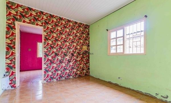 Terreno com 2 Casas de alvenaria no bairro Sarandi