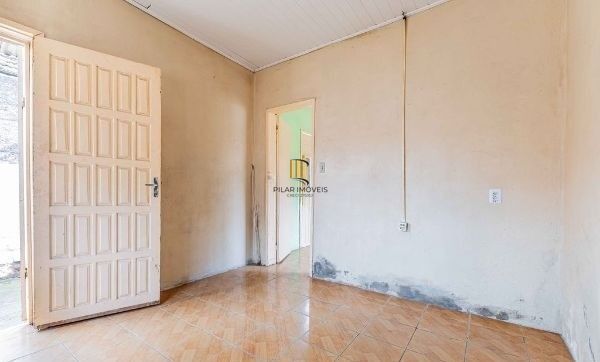 Terreno com 2 Casas de alvenaria no bairro Sarandi