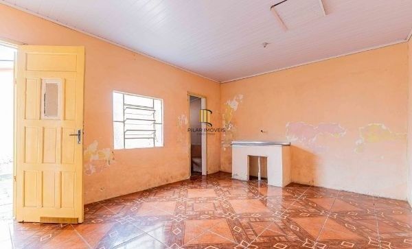 Terreno com 2 Casas de alvenaria no bairro Sarandi