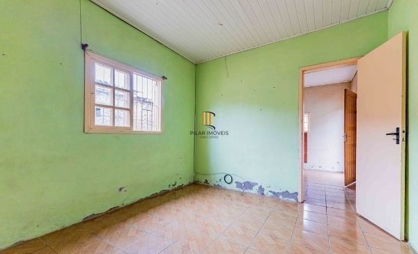 Terreno com 2 Casas de alvenaria no bairro Sarandi