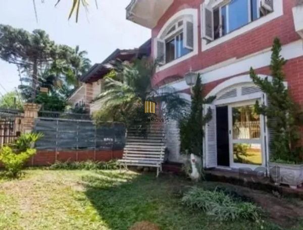 Casa sobrado no bairro Tristeza de 4 dormitórios