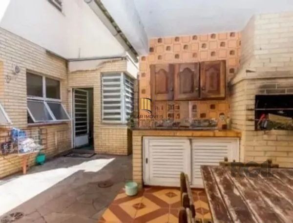 Casa sobrado no bairro Tristeza de 4 dormitórios