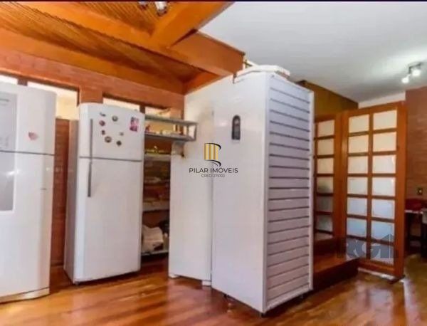 Casa sobrado no bairro Tristeza de 4 dormitórios