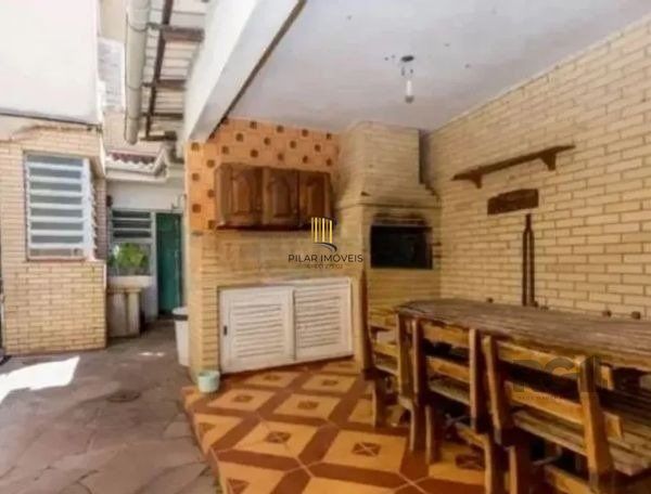 Casa sobrado no bairro Tristeza de 4 dormitórios