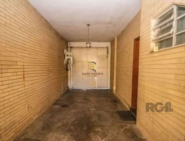 Casa sobrado no bairro Tristeza de 4 dormitórios