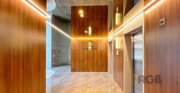 Apartamento no bairro Auxiliadora de 2 dormitórios vaga e infra